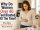American woman over 40 standing in her kitchen with hand on stomach, experiencing bloating and digestive discomfort after 40.